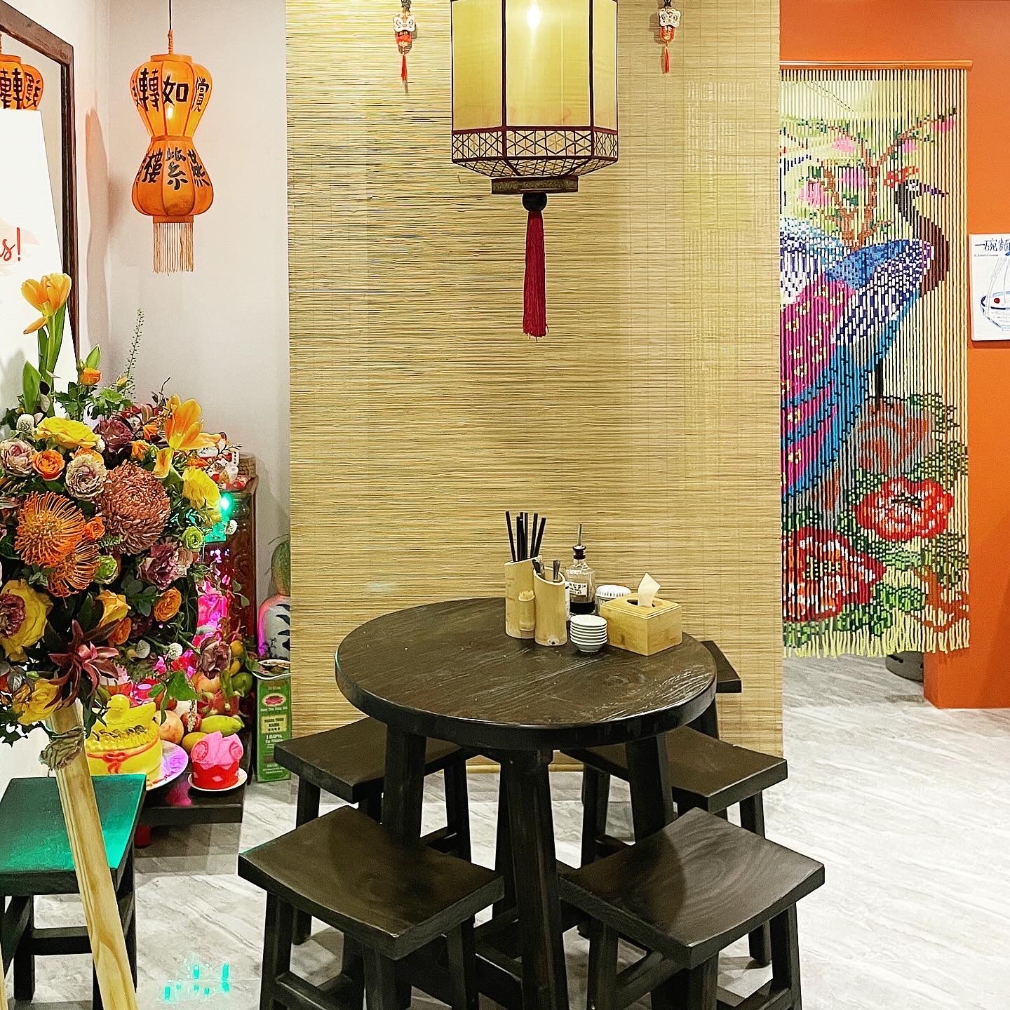 The dark round table under lantern light