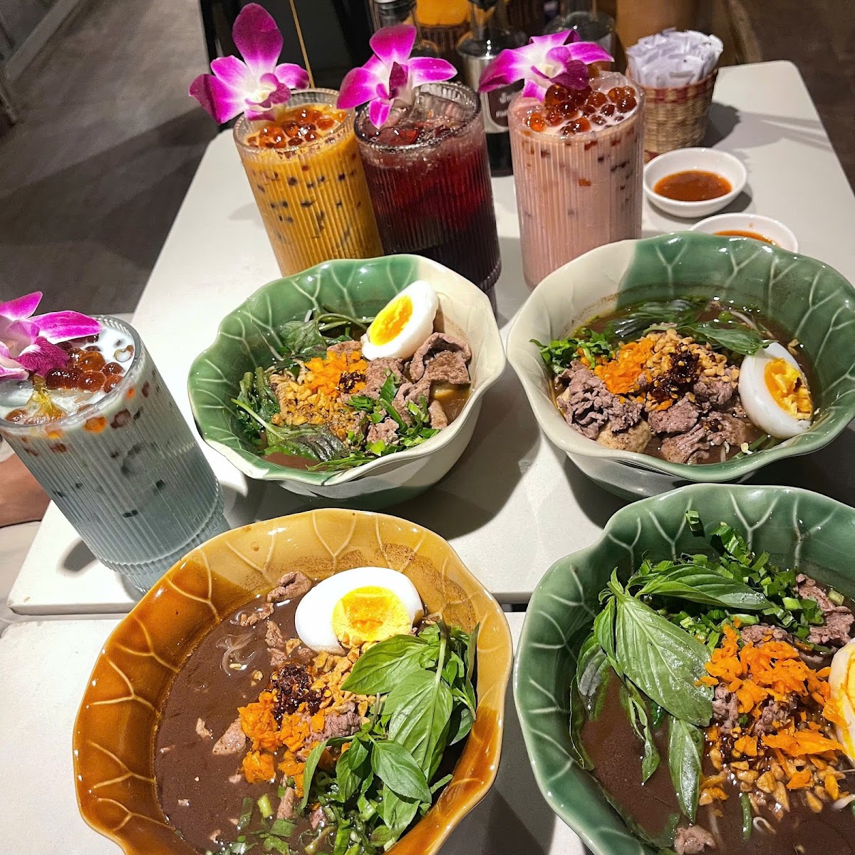 Four bowls and drinks