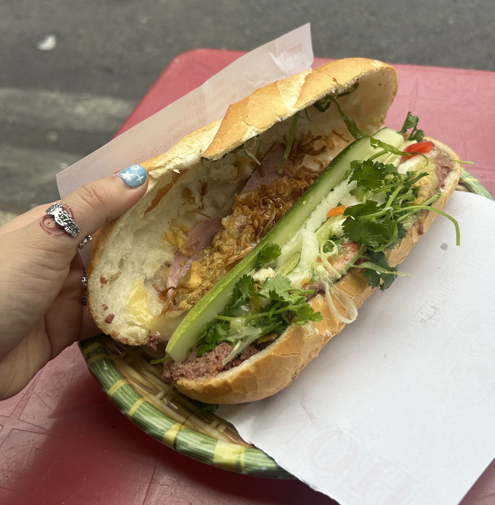 Open bánh mì — green cucumber, cilantro and fresh herbs