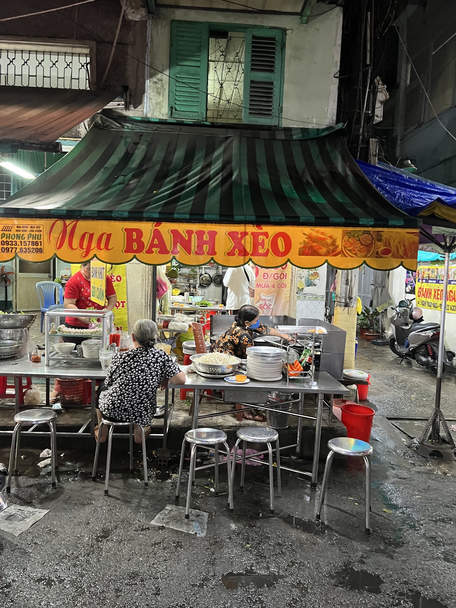 The hand-painted Bánh Xèo Nga street sign (pending the venue photo pass)