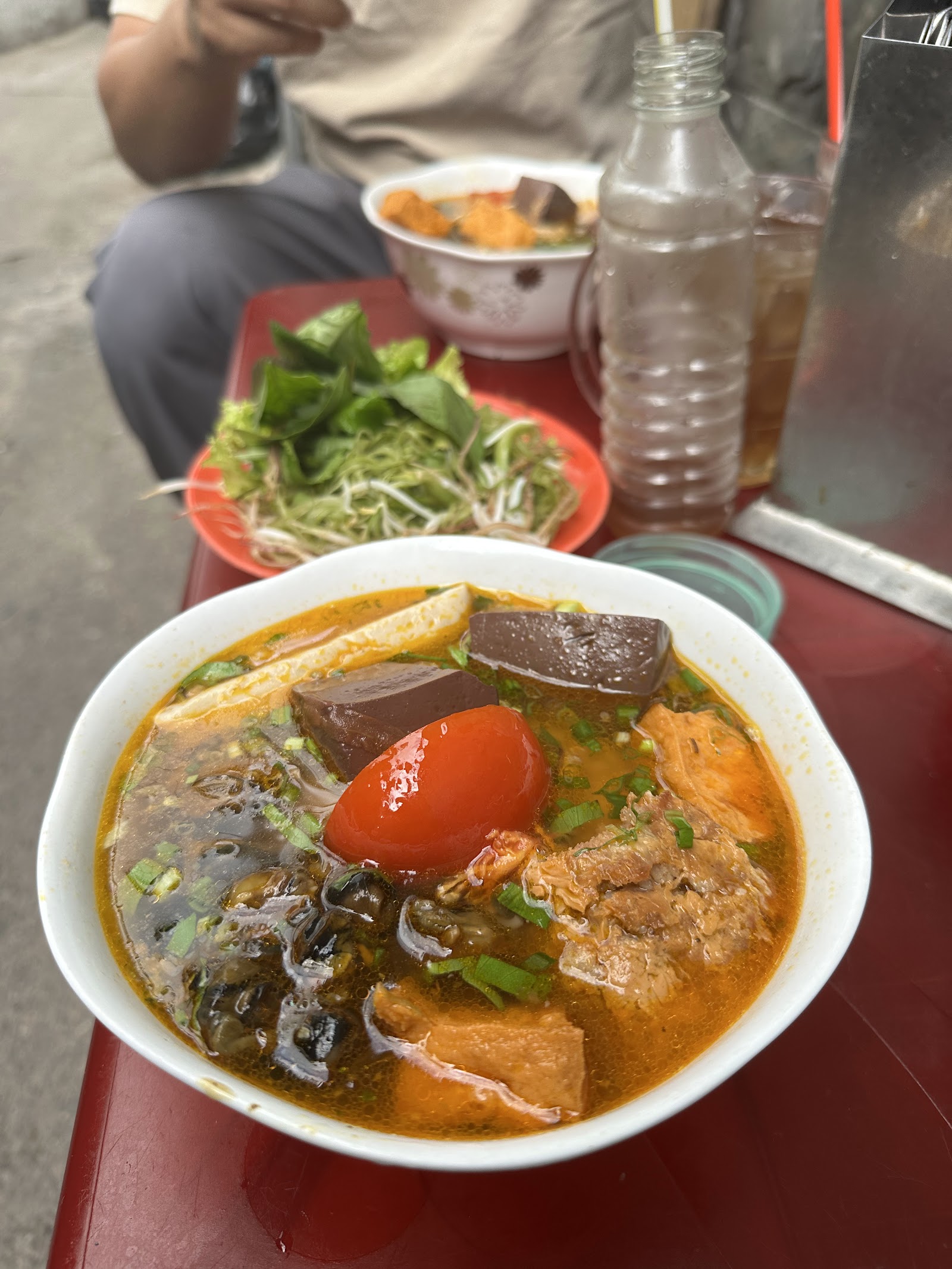 The Hòa Hưng afternoon bowl with raw herbs (pending the venue photo pass)
