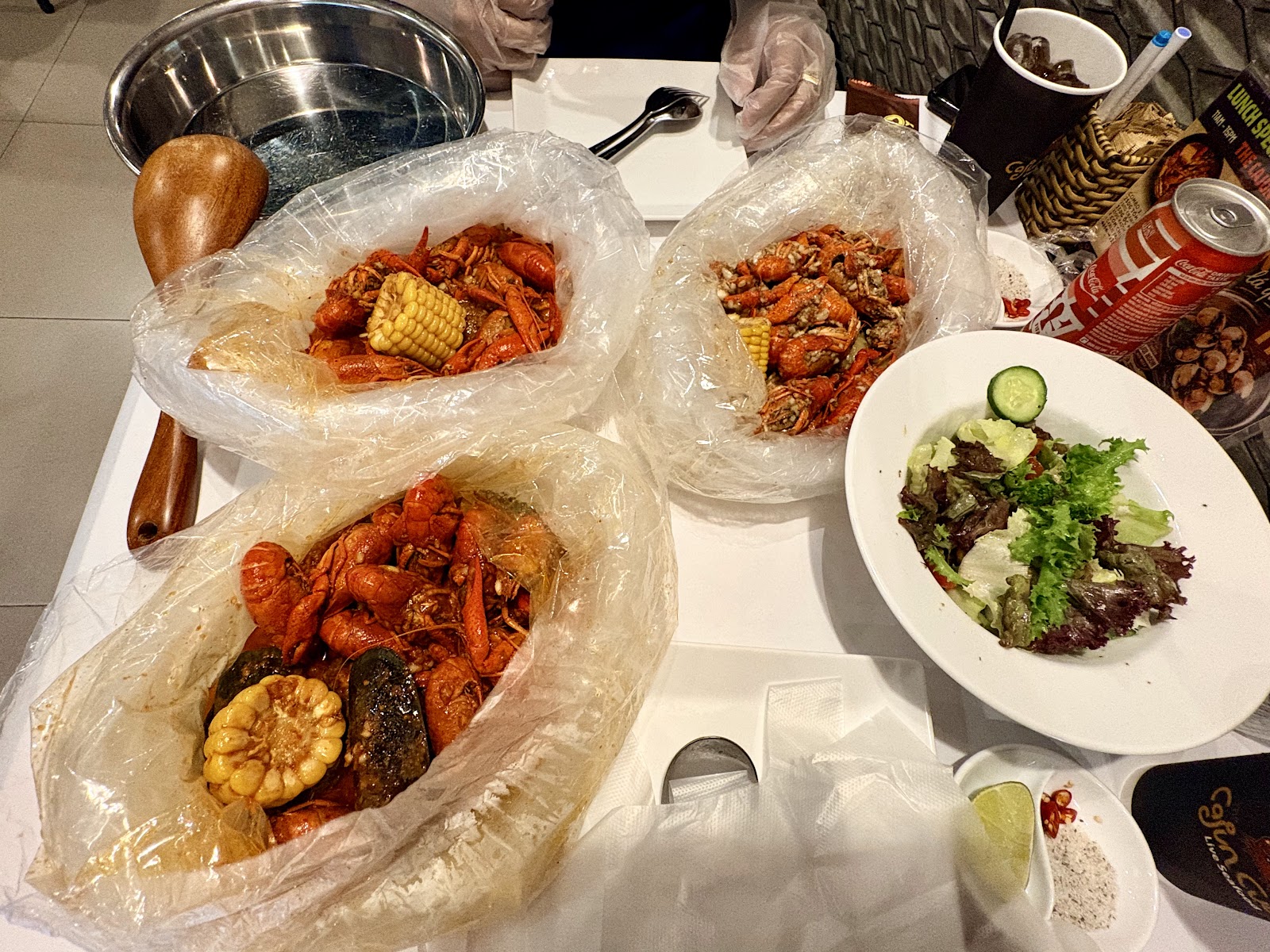 Seafood boil spread on the table at The Cajun Cua