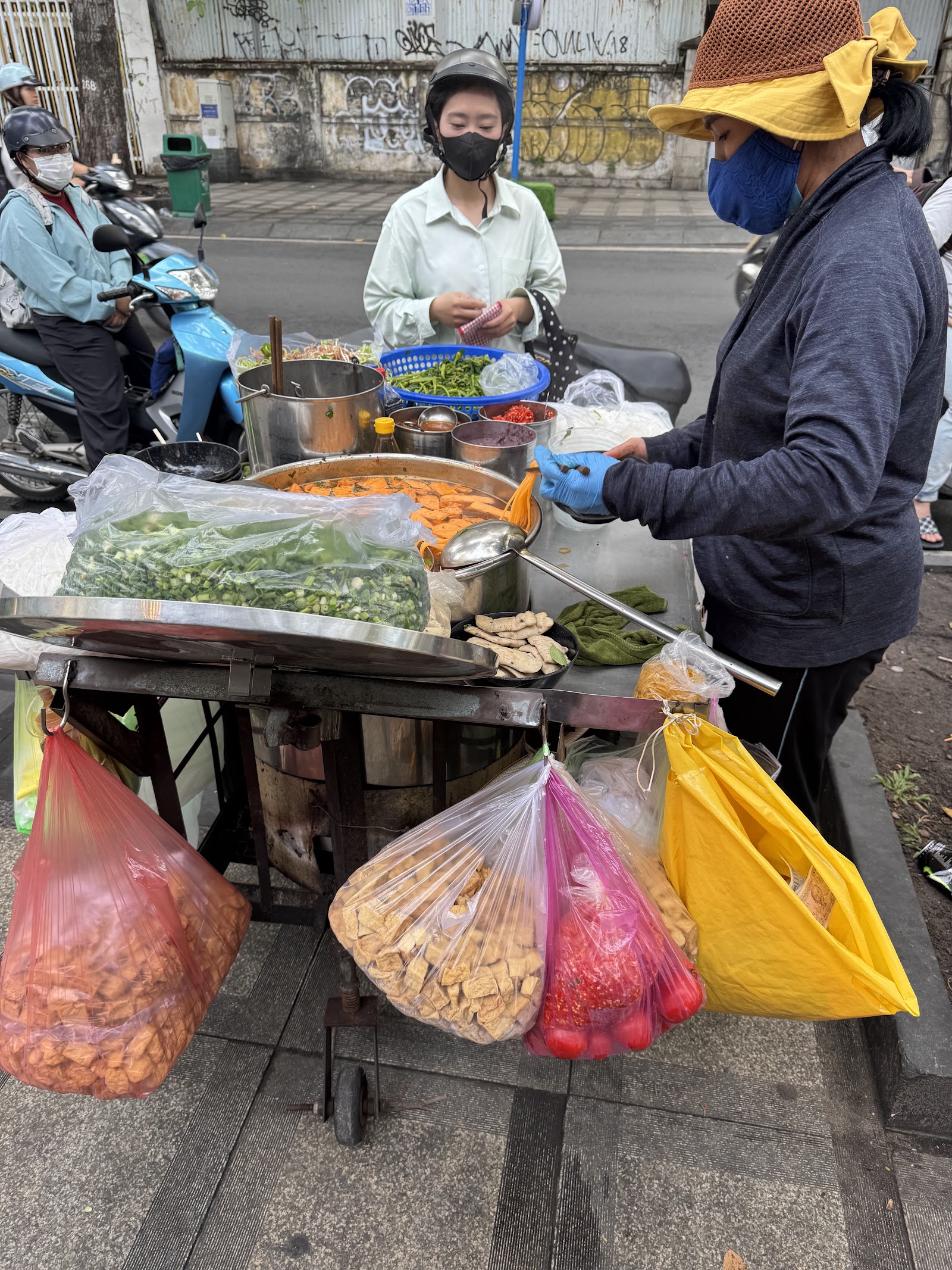 The sidewalk stand with plastic stools set out in the morning