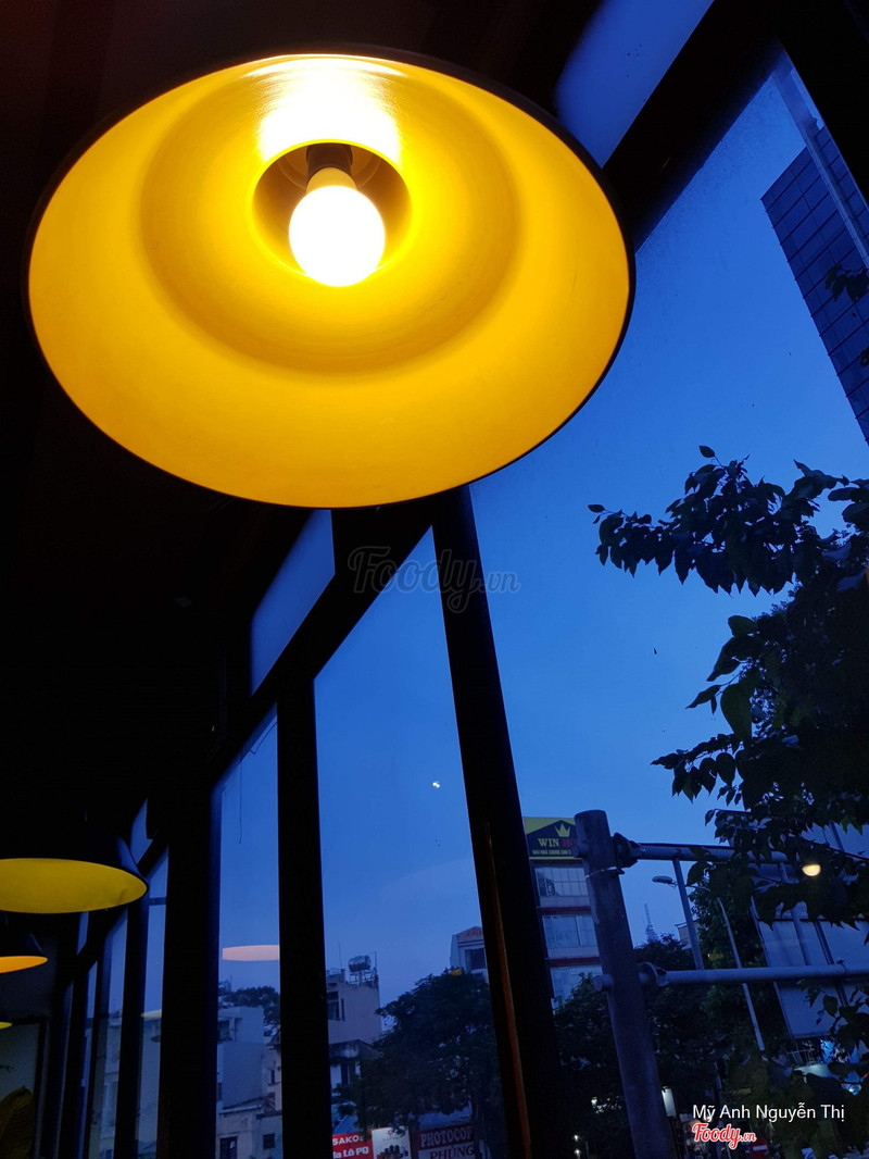 The pendant lamp by the window at dusk