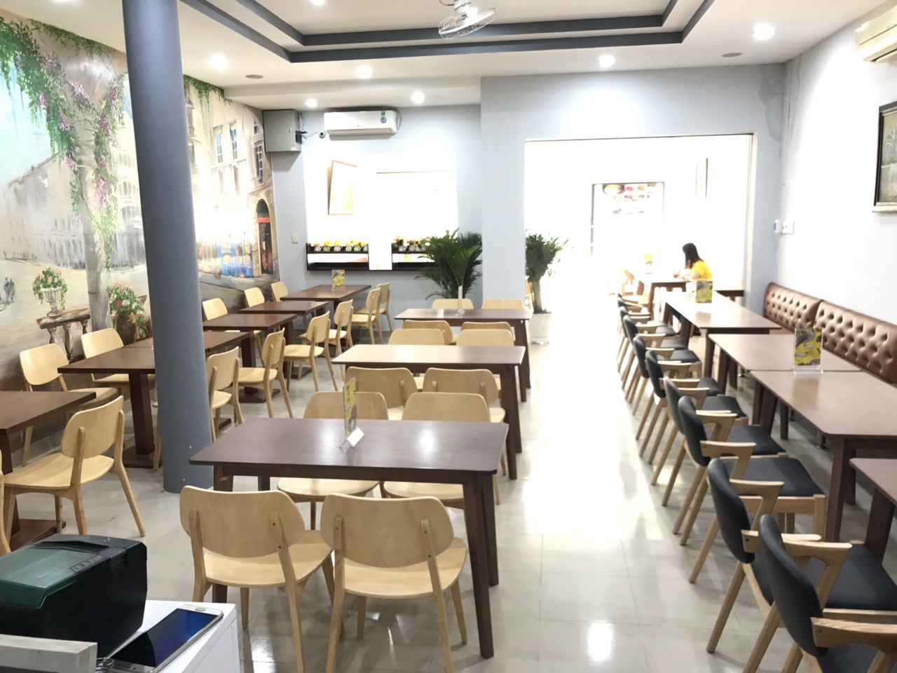 The warm dining room at Com Nieu Thien Ly
