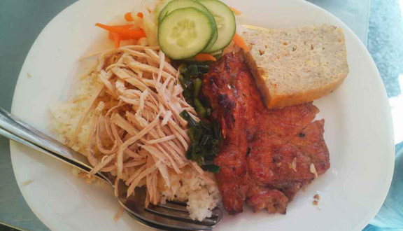A plate of rib, pork-skin and egg-loaf broken rice at Com Tam Kieu Van, Nguyen Trai