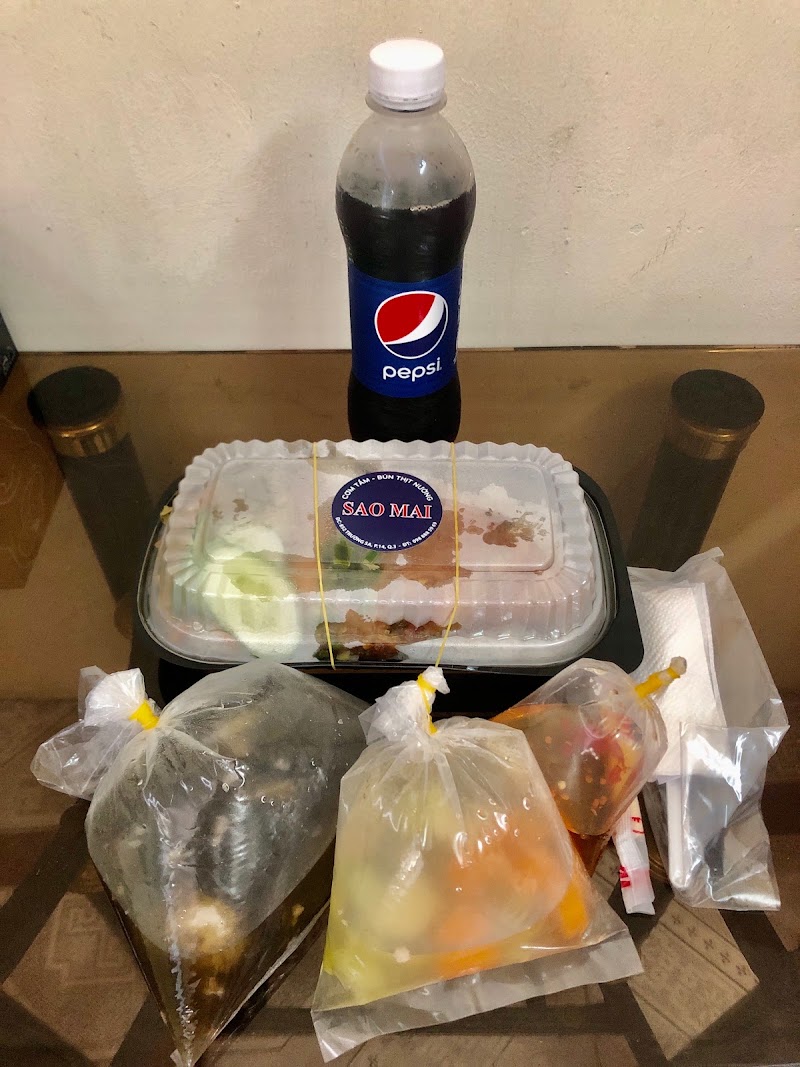 Sao Mai takeaway box — paper box with the round Sao Mai sticker, soup and fish sauce in separate bags