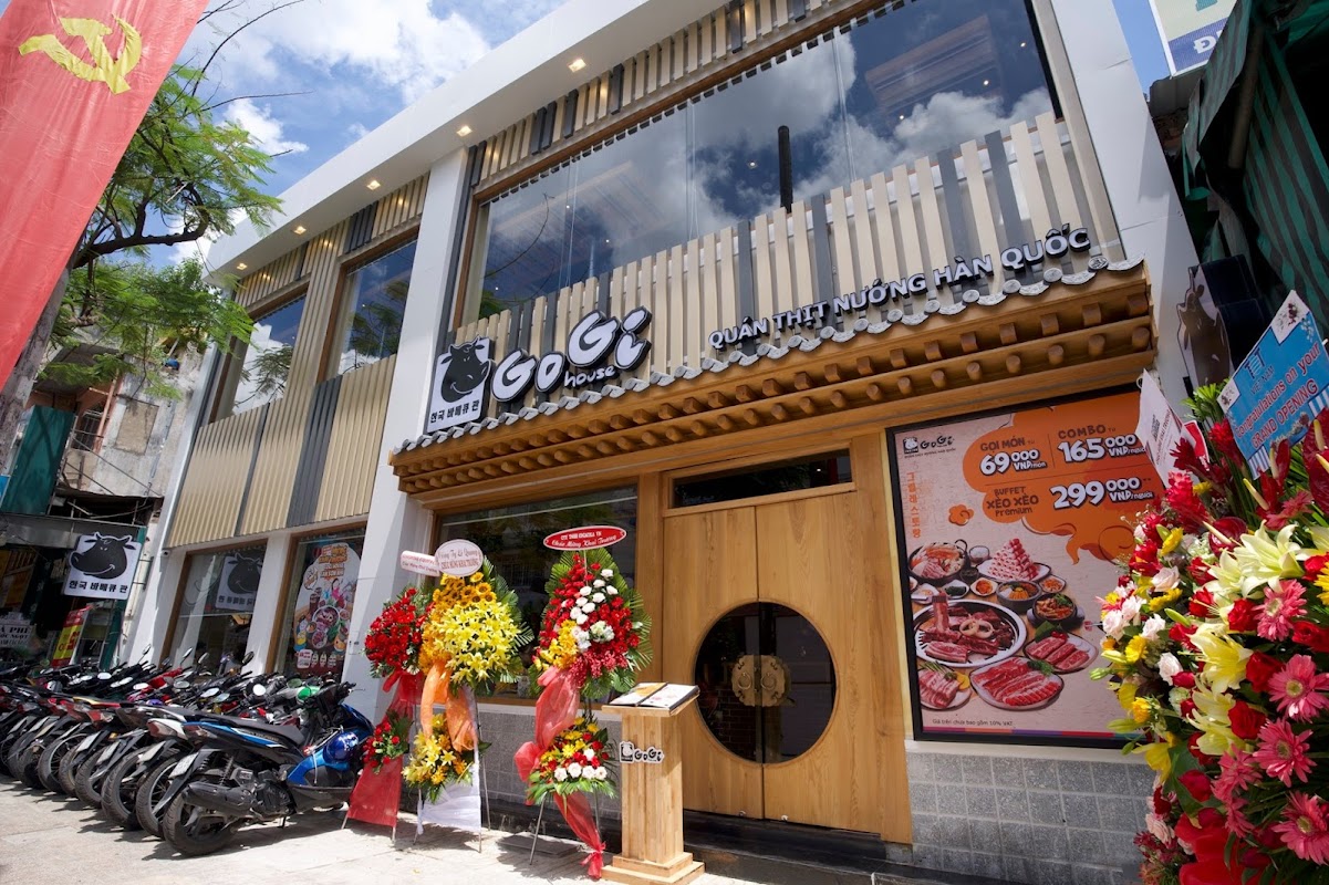 A street-front GoGi branch facade — illustrative photo