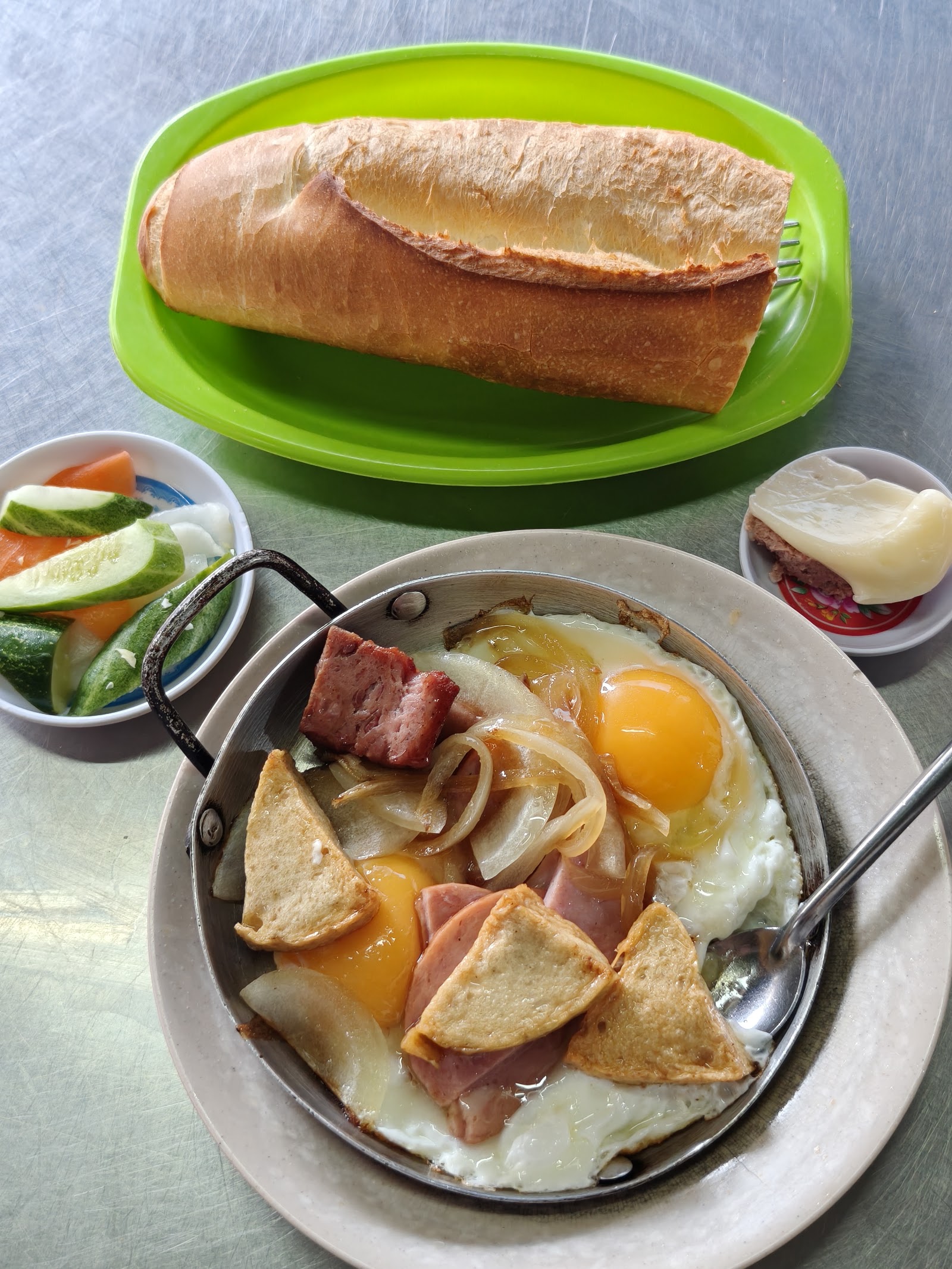 A steaming skillet of meats