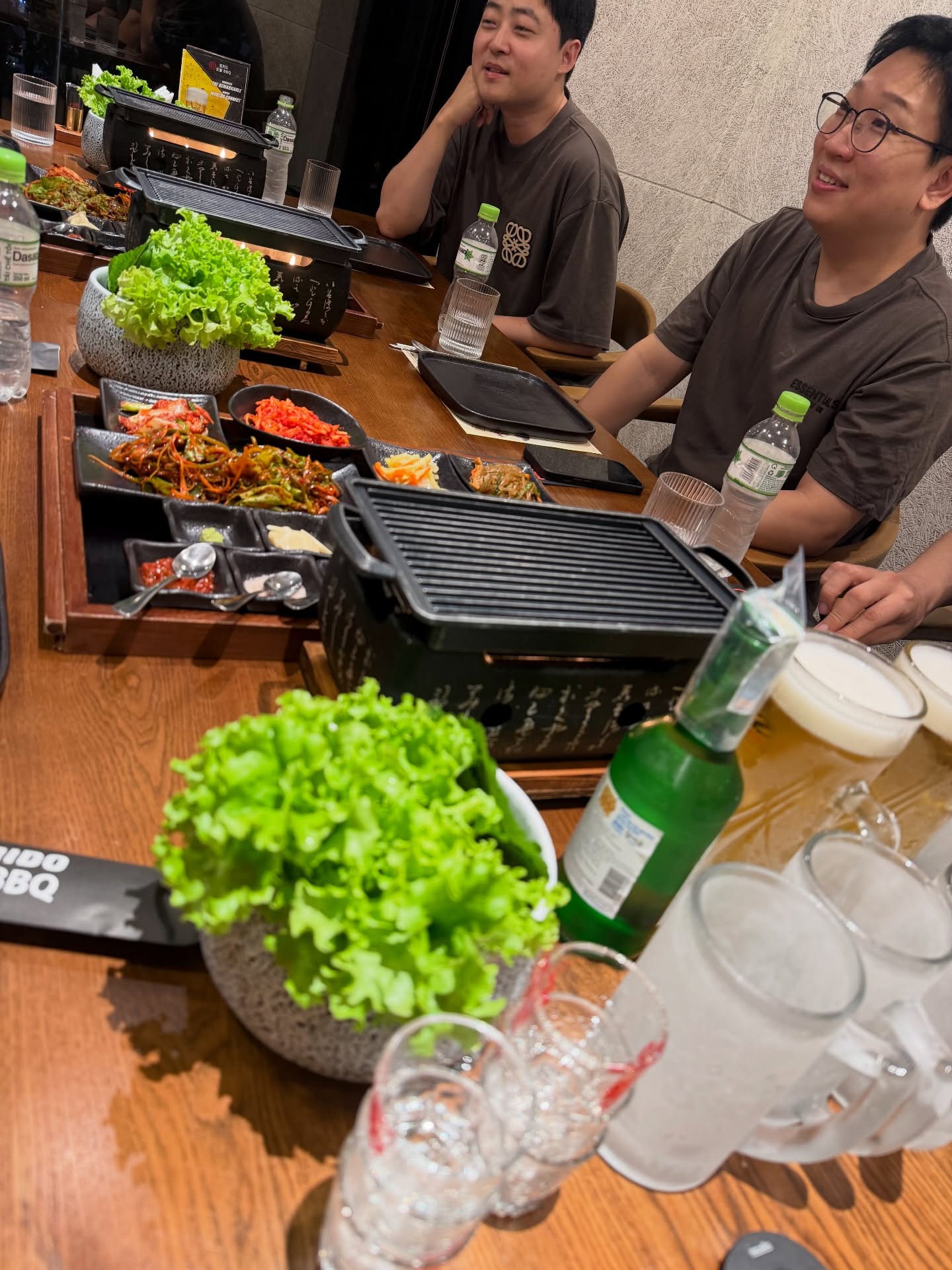 Tabletop grill — diners eating Korean BBQ style