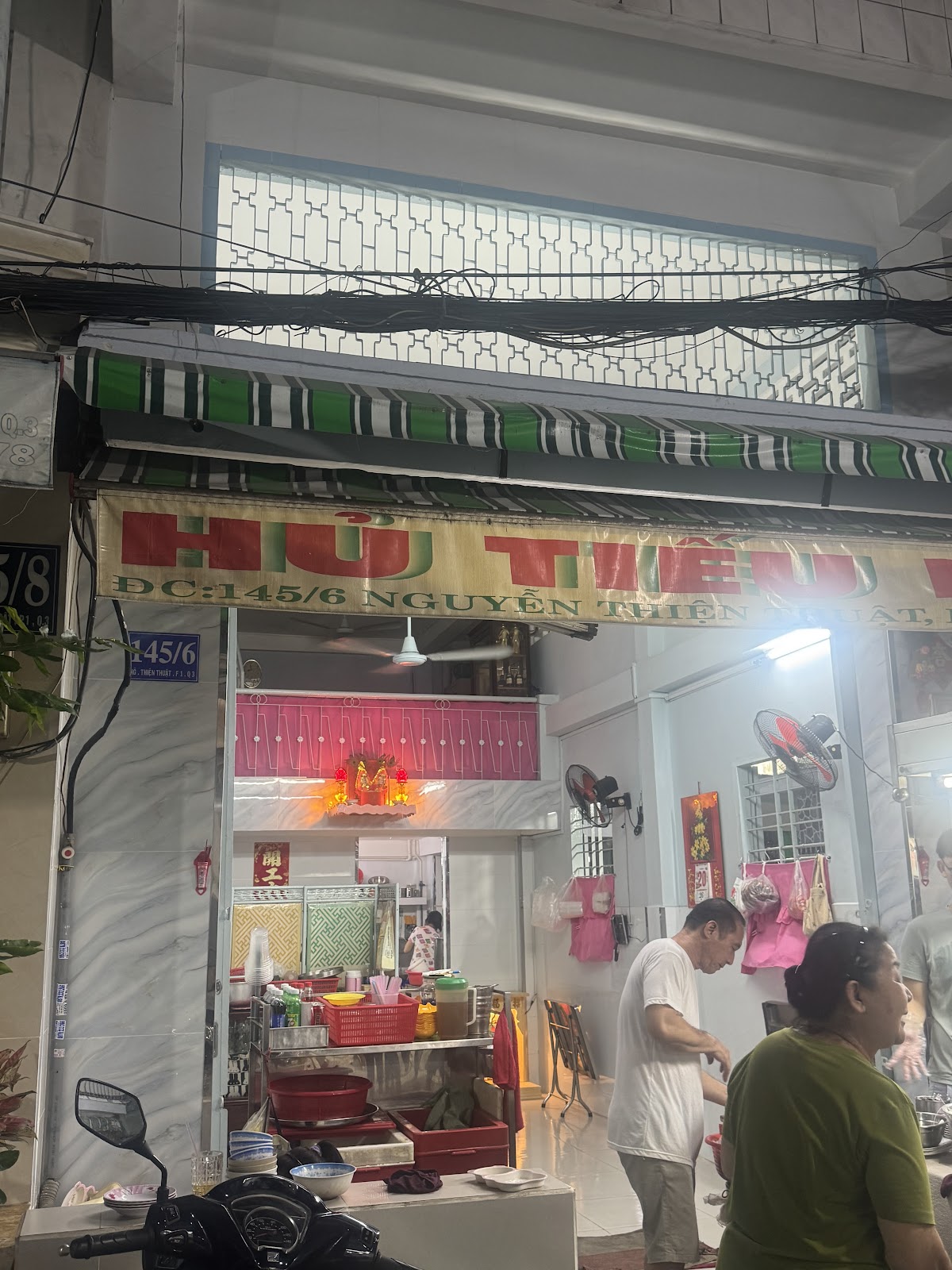 Truong Thanh storefront at night on Nguyen Thien Thuat street