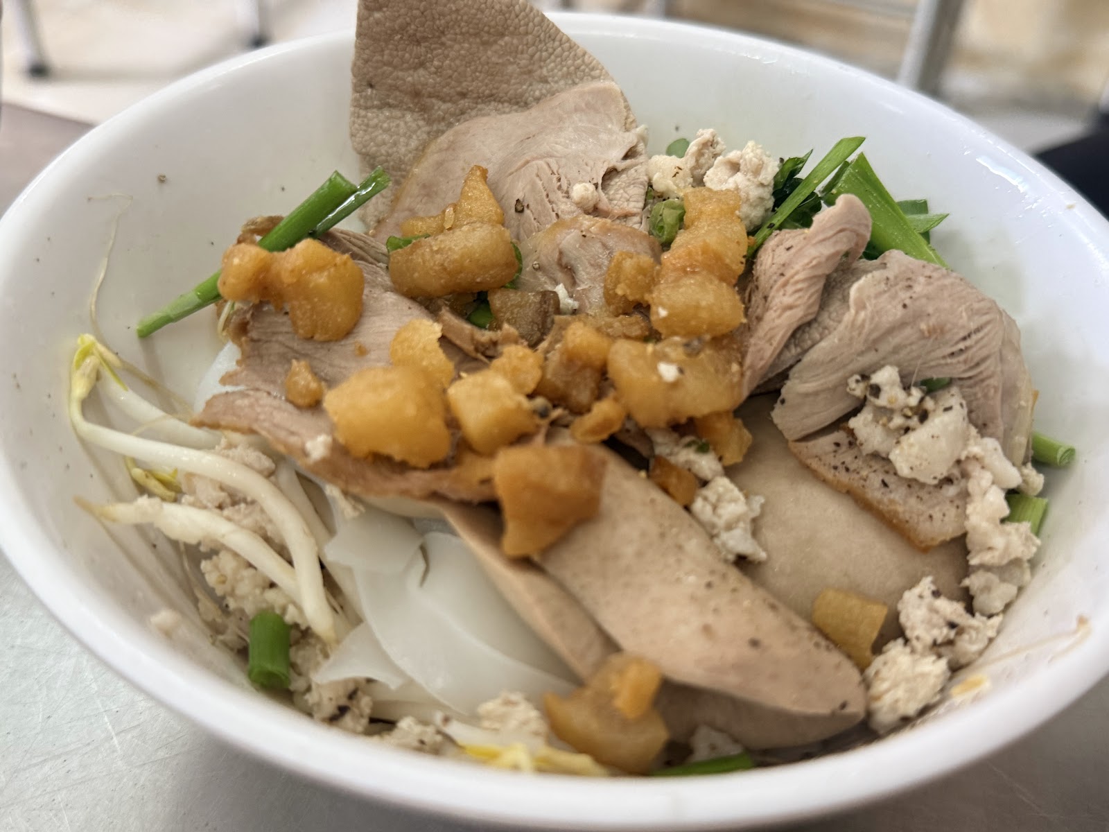 Noodle bowl with golden broth