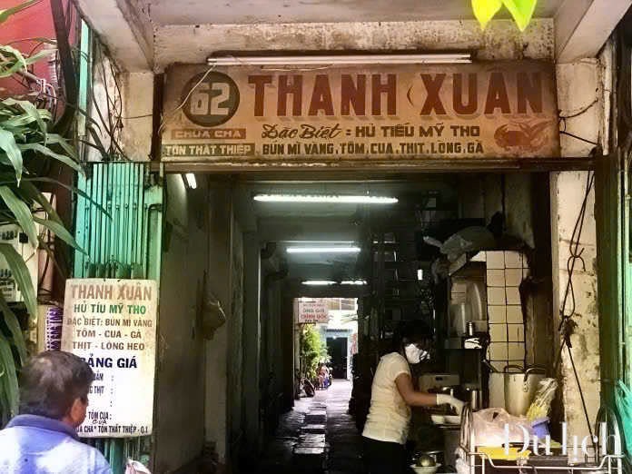 The Thanh Xuan storefront — the sun-faded '62 Thanh Xuan — My Tho Hu Tieu' painted sign