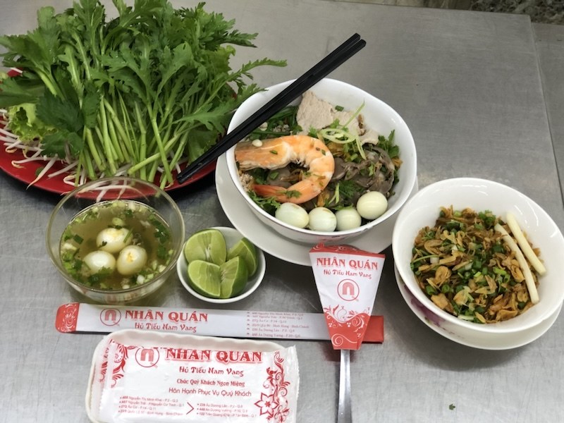 A table at Nhân Quán with branded packaging