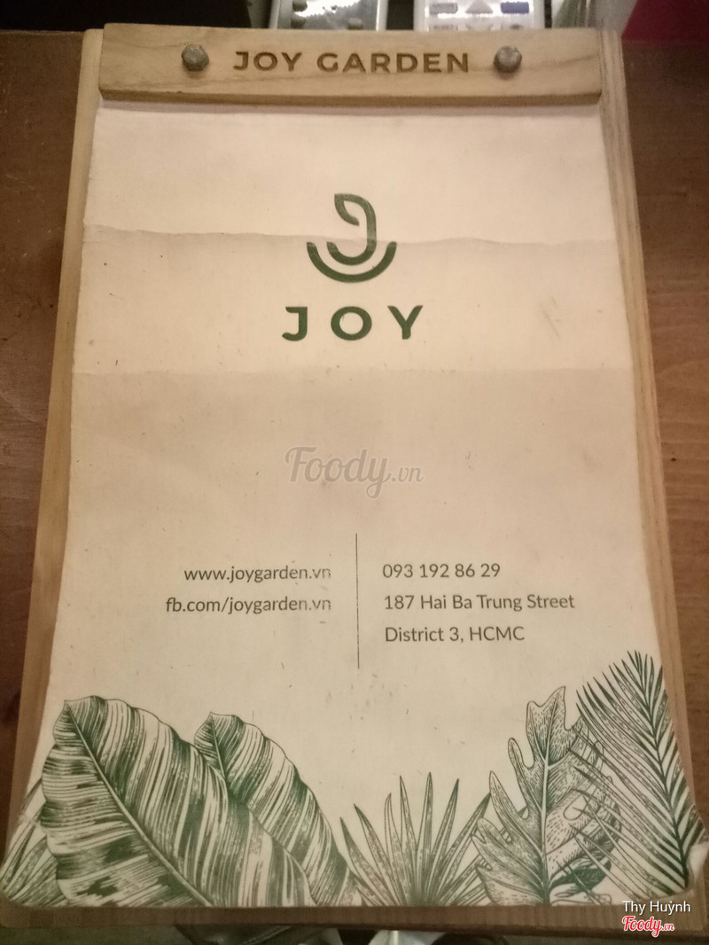 The café’s official menu board with the JOY logo