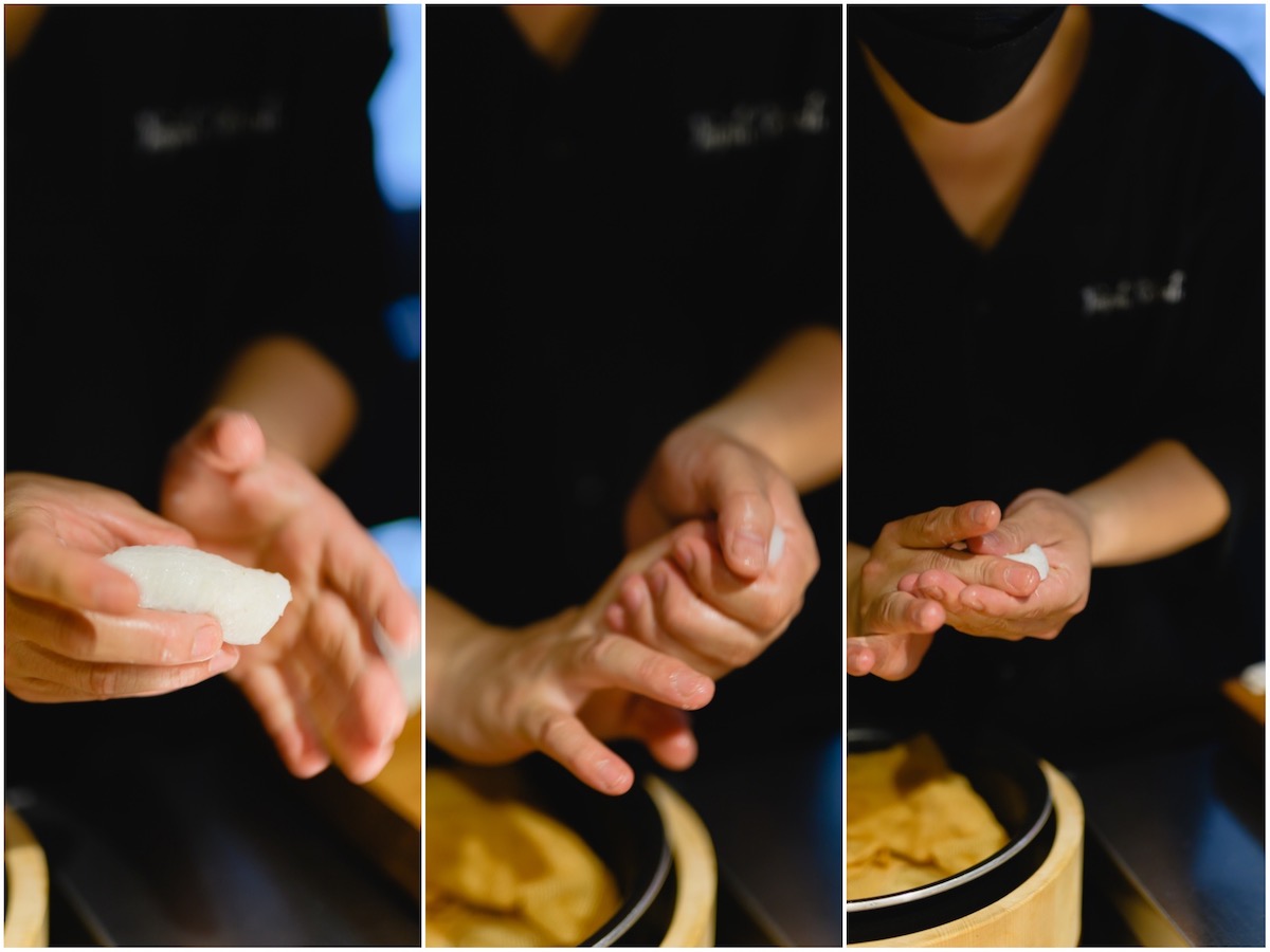 The itamae's hands forming nigiri