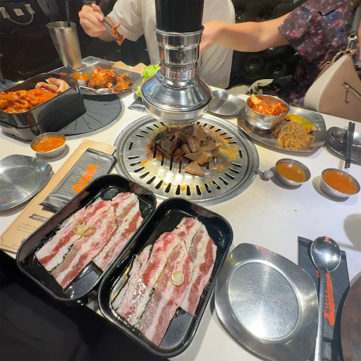 Table loaded with meat trays