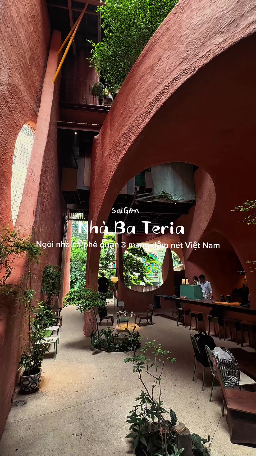 The sculpted terracotta courtyard with the green matcha bar inside