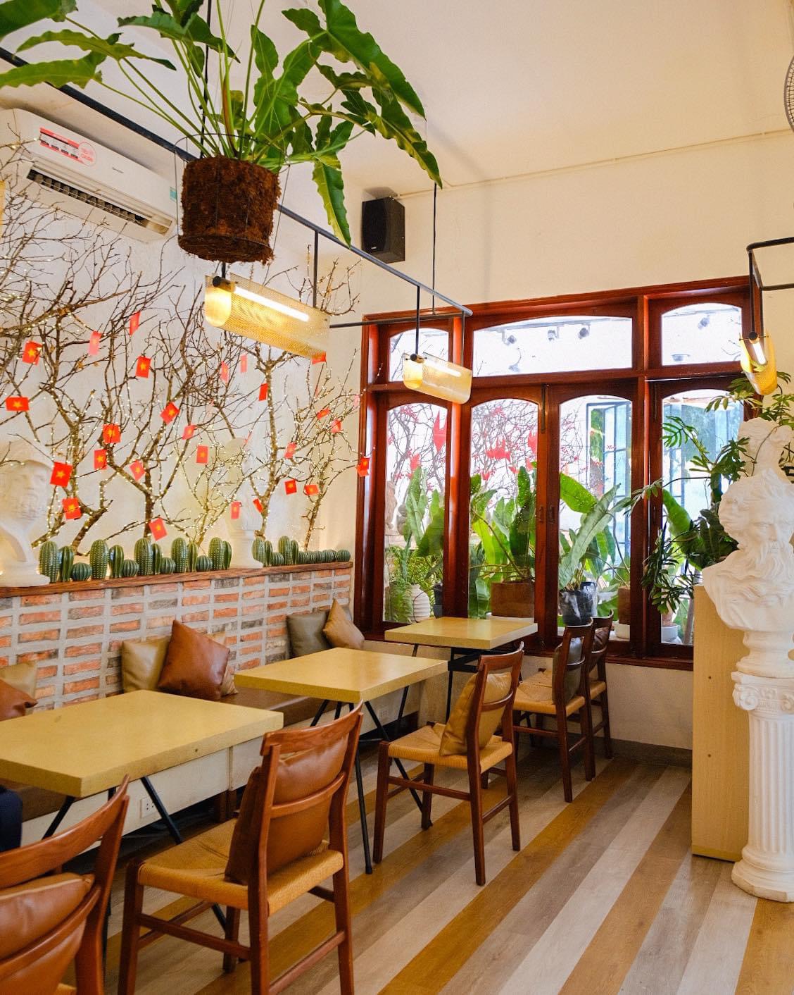 The indoor space with brick walls and wood windows