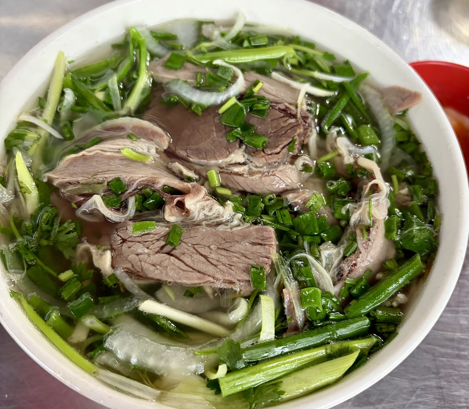 Mặt tiền Phở Bò Phú Gia — tấm biển vàng