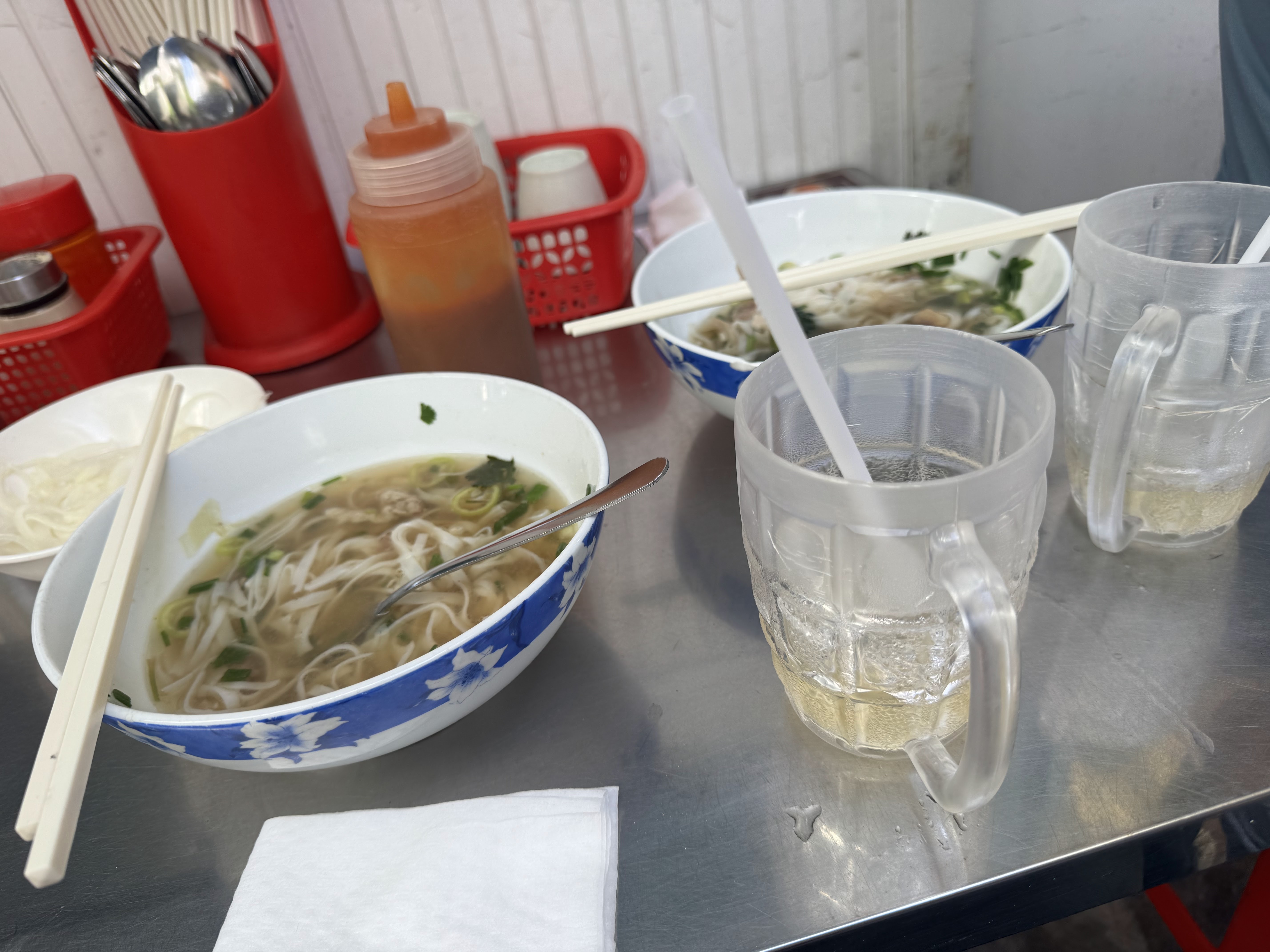 A Pho Dau bowl with iced tea