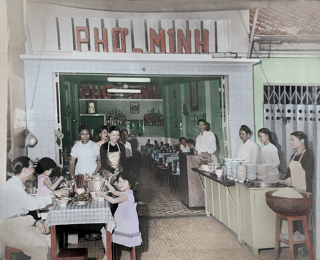The shopfront before 1975 — the PHỞ MINH sign has been there since the early days.