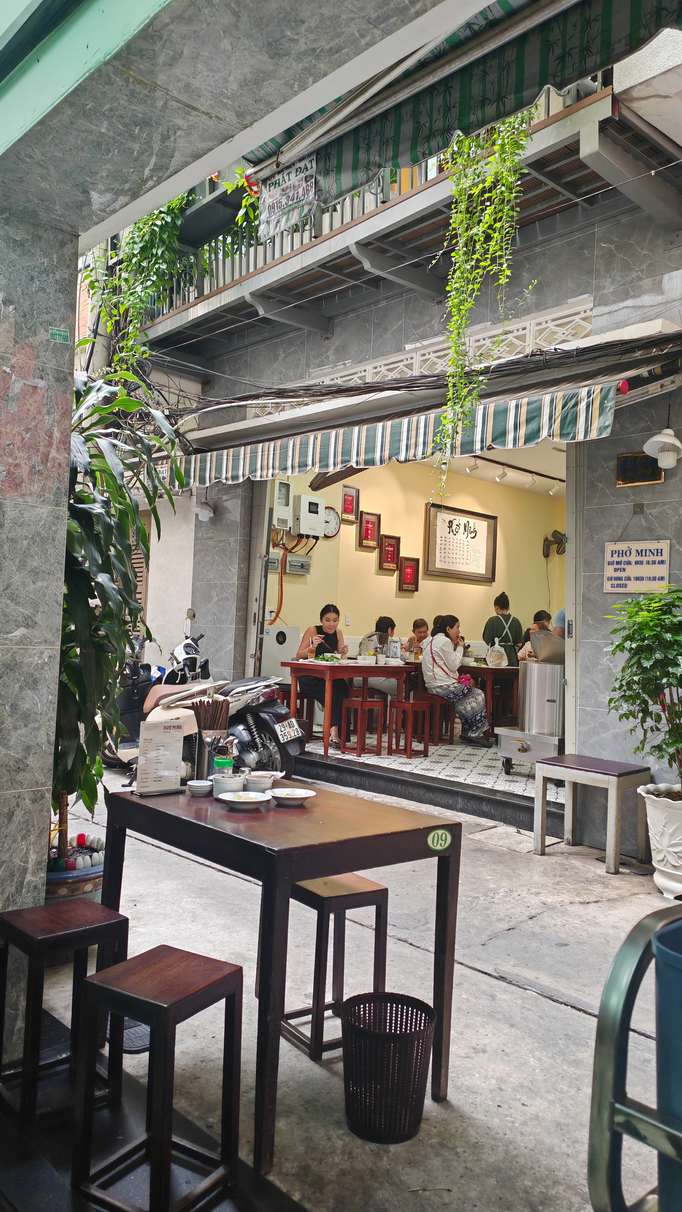Phở Minh's shopfront in the Pasteur alley on a morning
