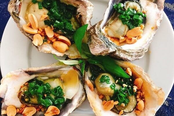 Grilled oysters with scallion oil