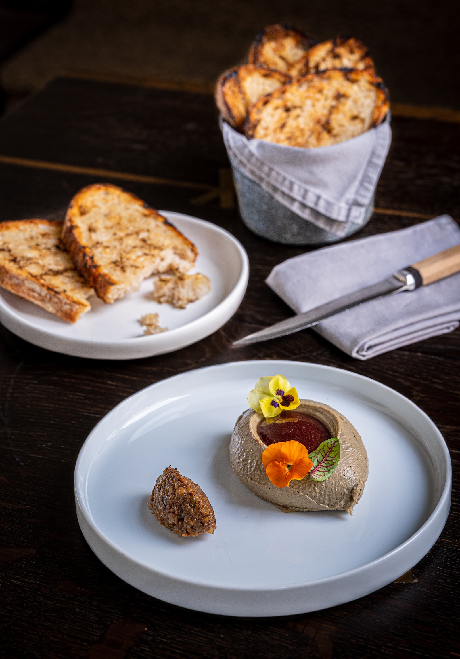 Foie gras mousse with edible flowers, served with toast