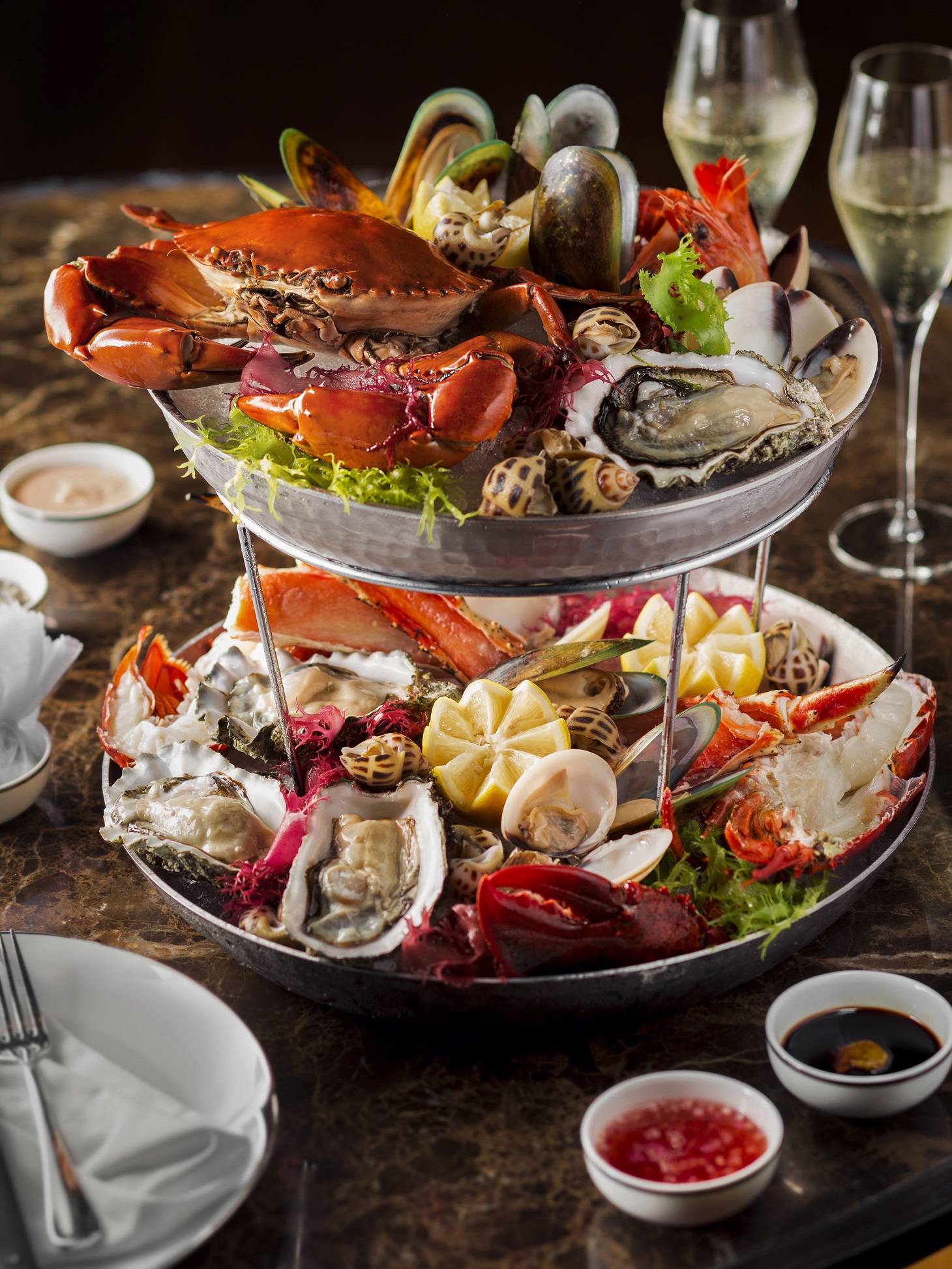 The tiered seafood tower — crab, oysters, lobster — the owner-posted photo, Mar 2018