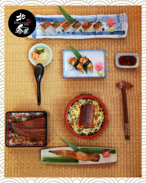 The chef shaping sushi