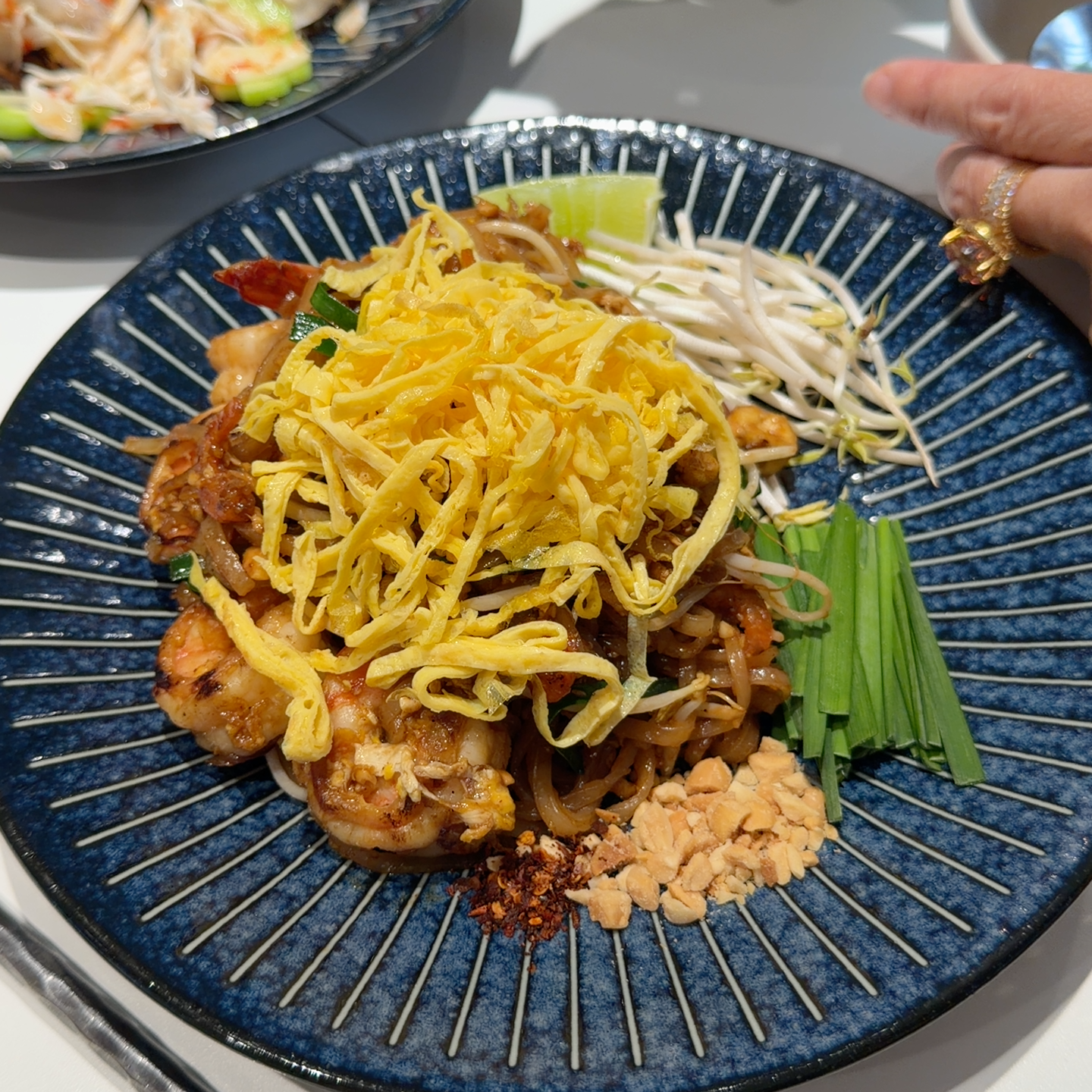 Prawn Pad Thai with egg ribbons and peanuts