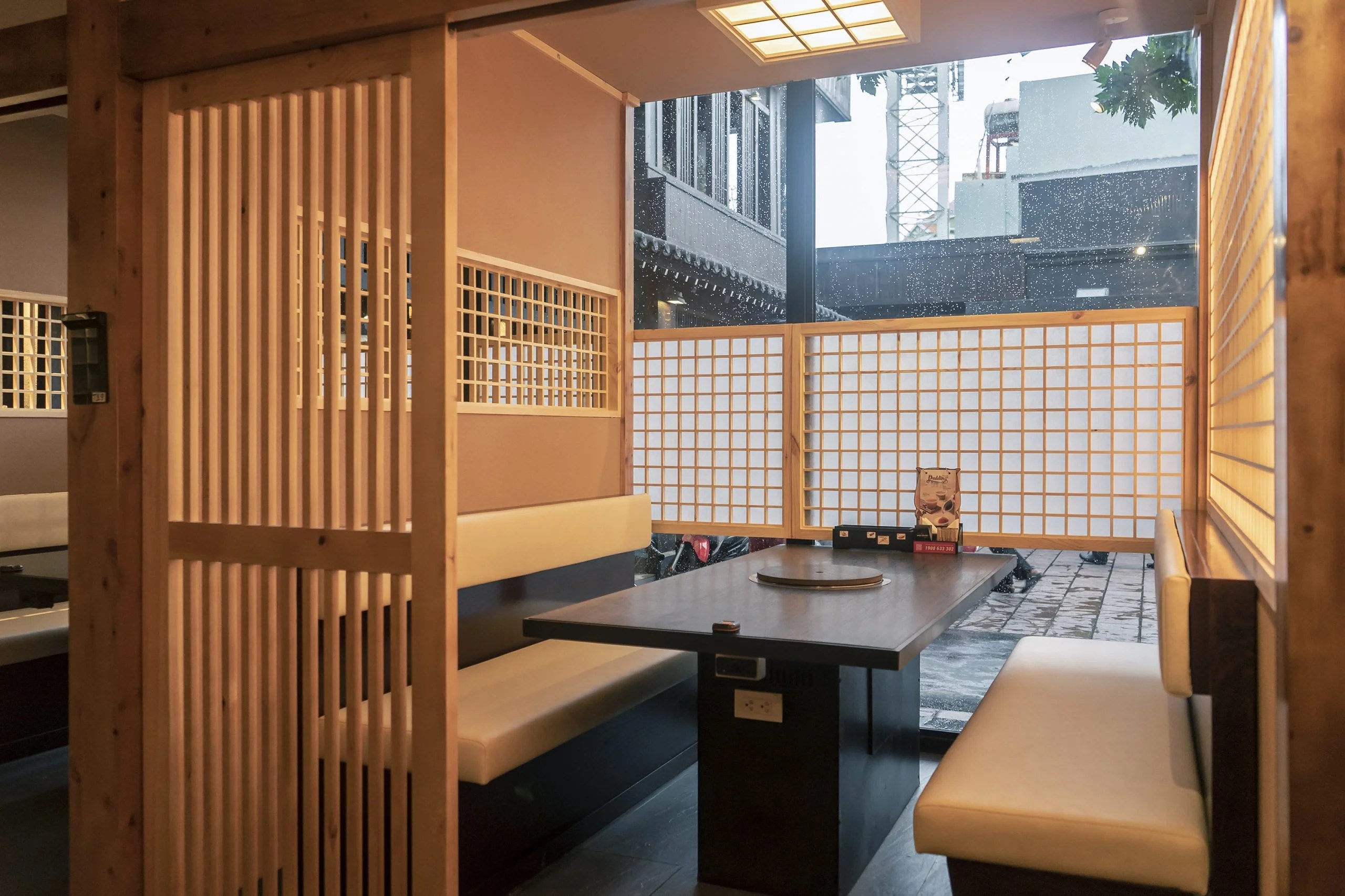 Shoji-style wooden lattice screens in the dining room