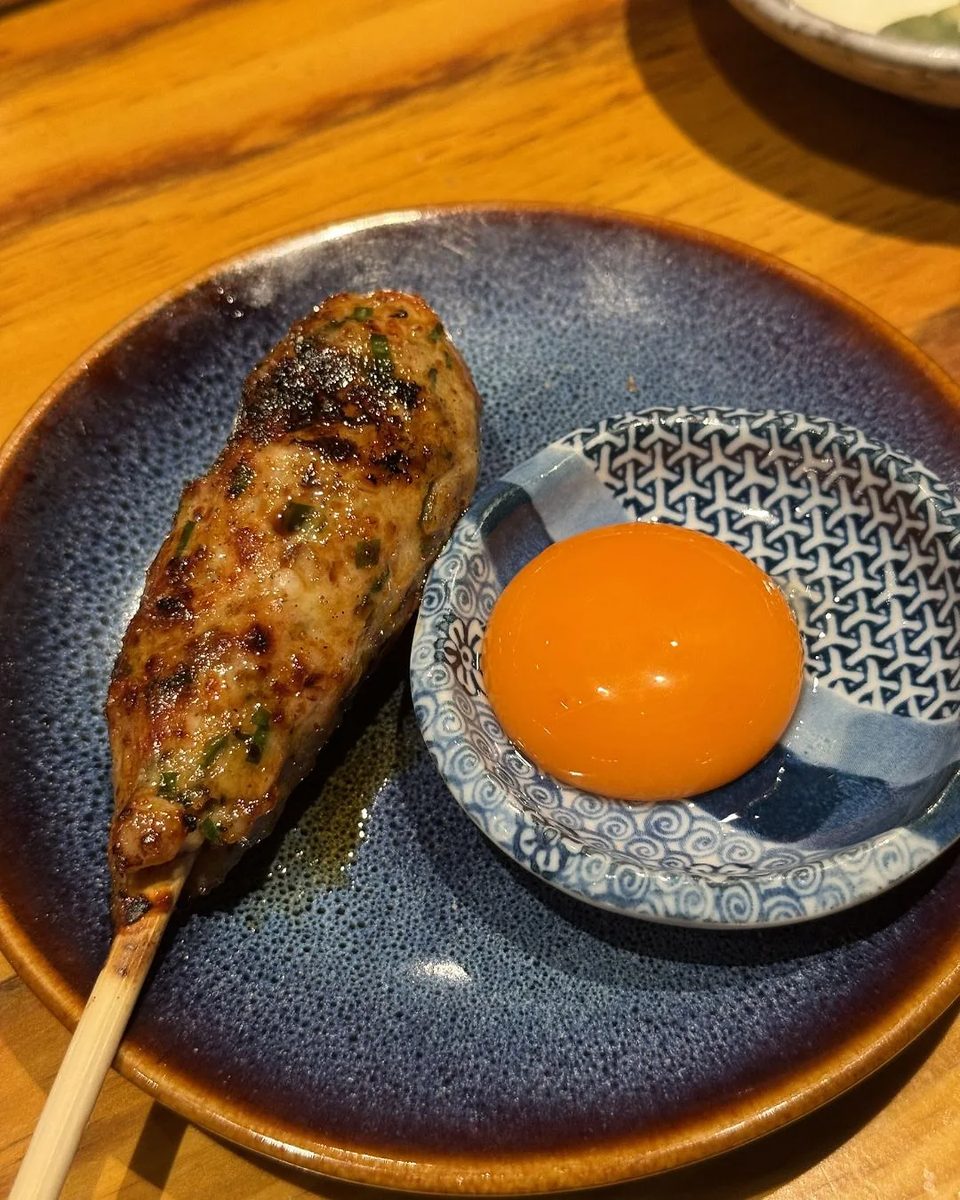 Tsukune skewer with an egg-yolk dipping dish